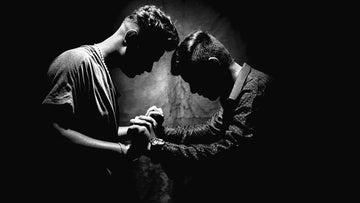 Two Men Holding Hands
